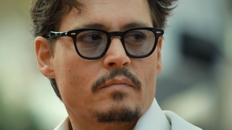 Johnny Depp wearing glasses