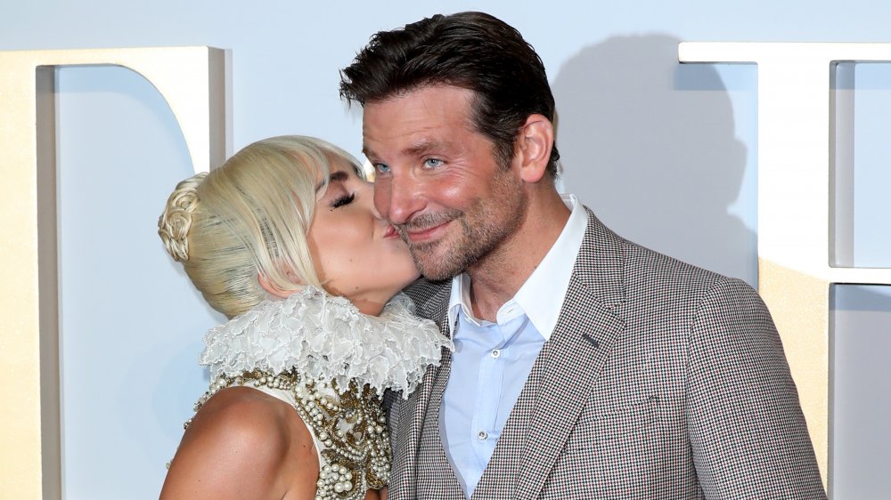 Lady Gaga kissing Bradley Cooper on the cheek