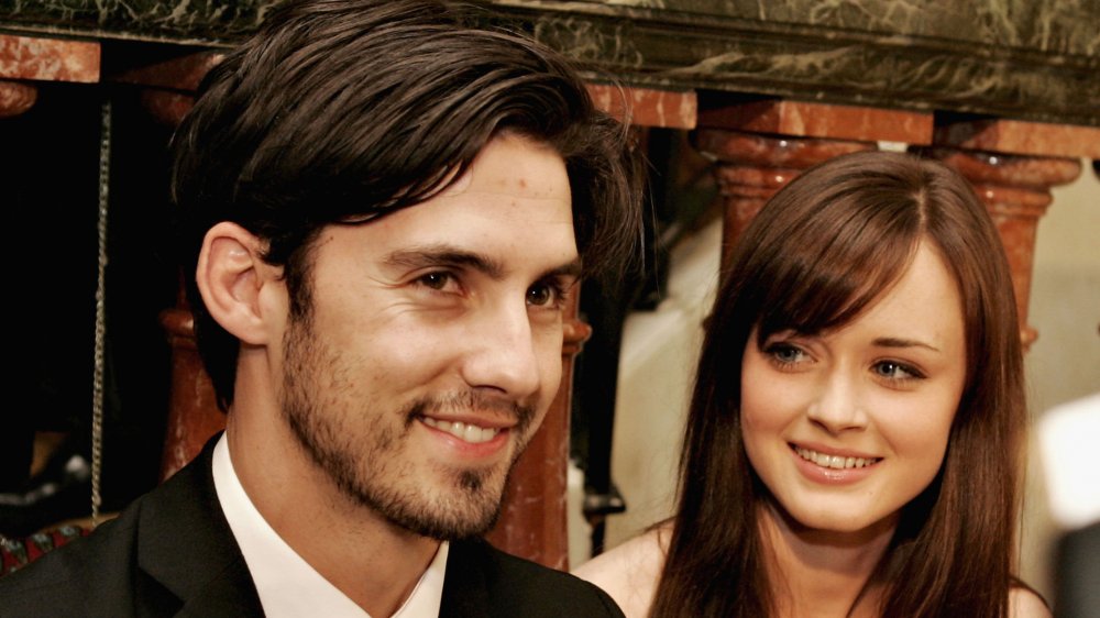 A young Milo Ventimiglia and Alexis Bledel, both smiling