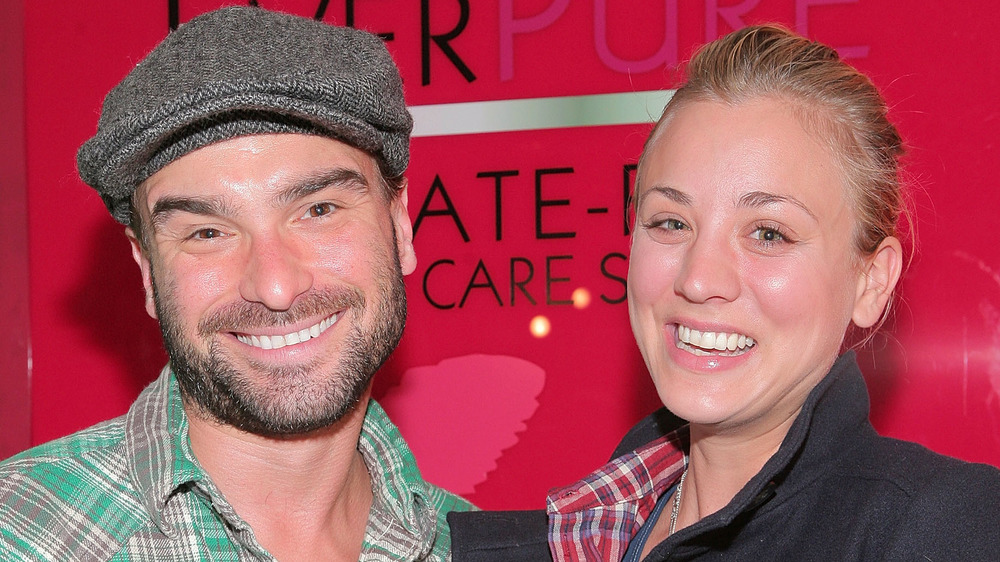 Johnny Galecki and Kaley Cuoco smiling and laughing 