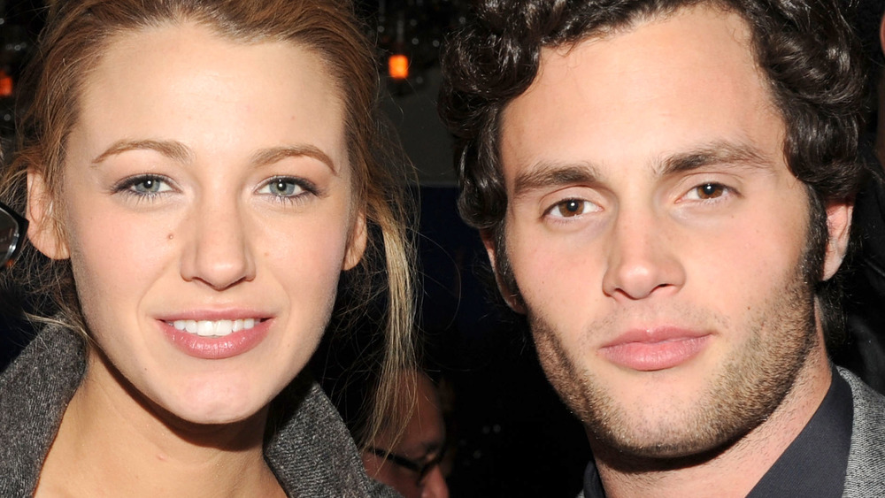 Blake Lively and Penn Badgley smiling 