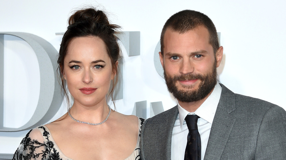 Dakota Johnson and Jamie Dornan posing together