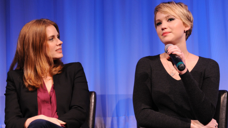 Amy Adams and Jennifer Lopez wearing black