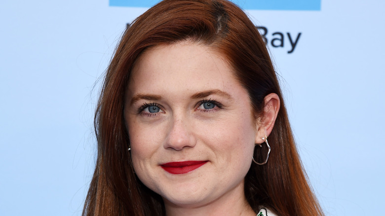 Bonnie Wright smirking