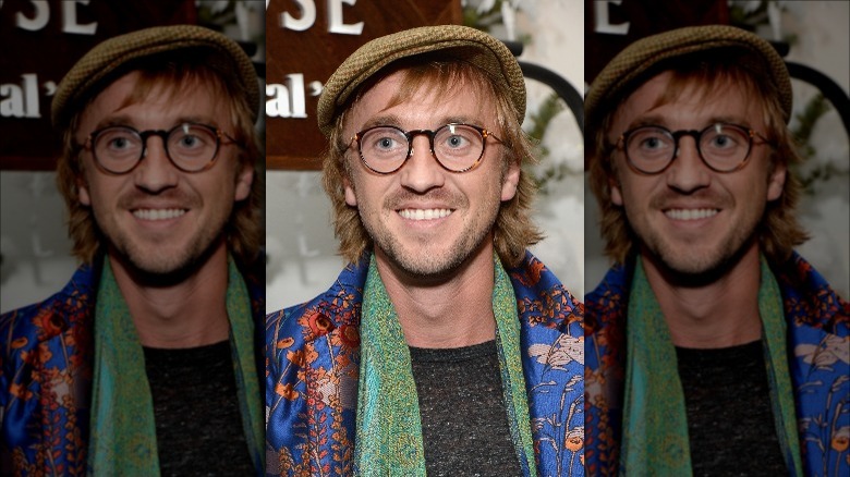 Tom Felton smiling