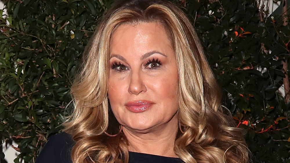 Jennifer Coolidge looking at camera