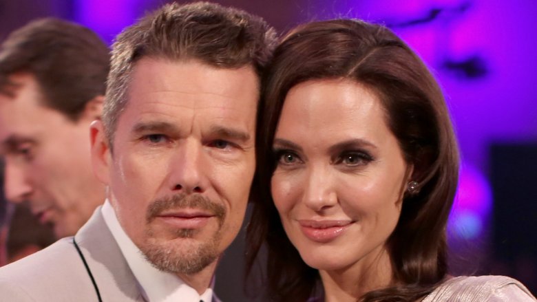 Ethan Hawke and Angelina Jolie posing