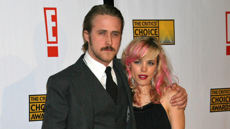 Ryan Gosling with arm around Rachel McAdams