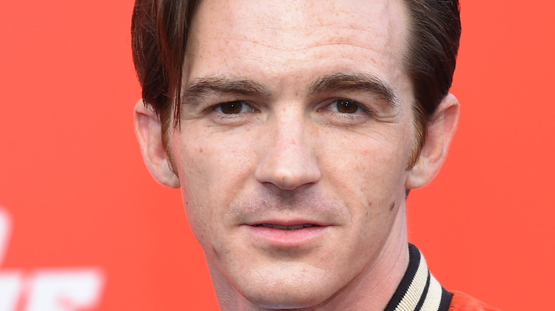 drake bell orange background