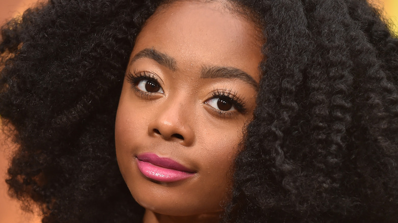 skai jackson afro hair pink lipstick