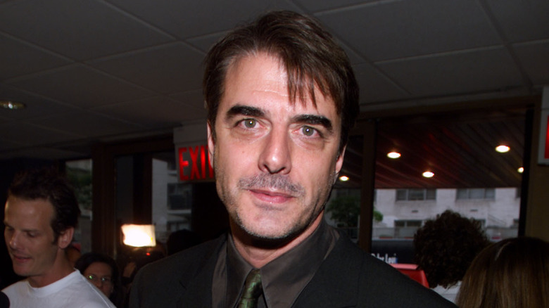 Chris Noth looks at camera