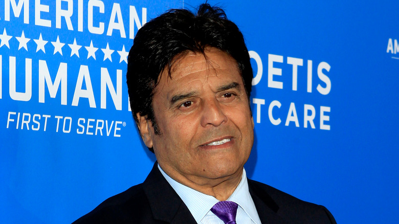 Erik Estrada in front of a step-and-repeat