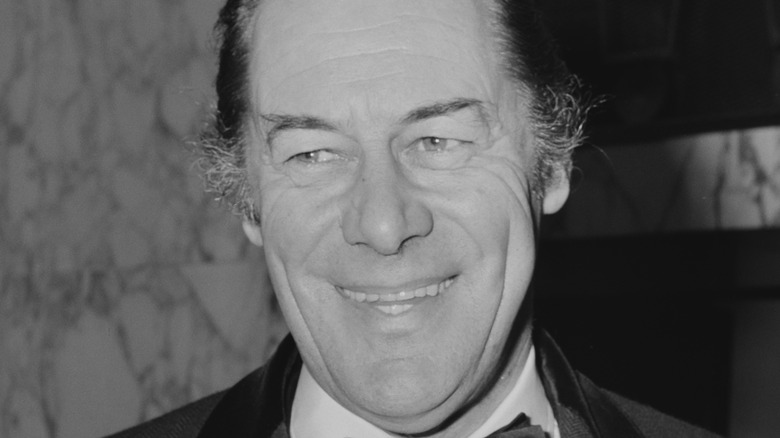 Rex Harrison laughing 