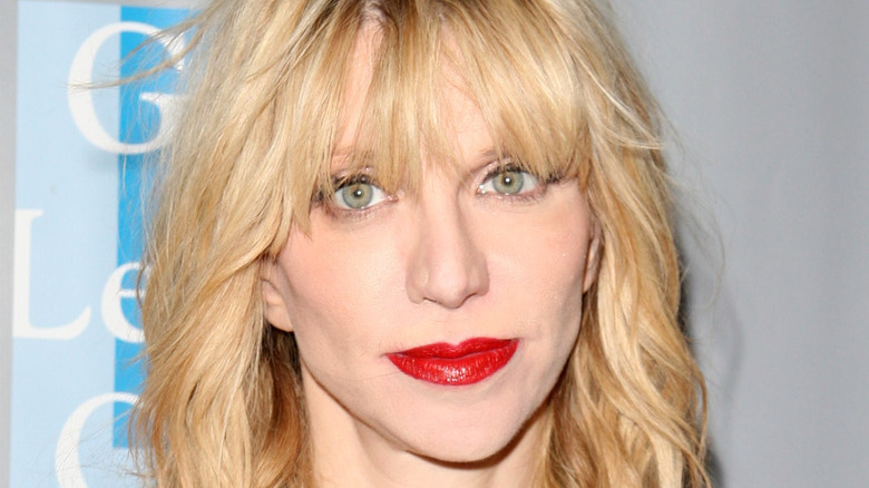 Courtney Love wearing red lipstick 