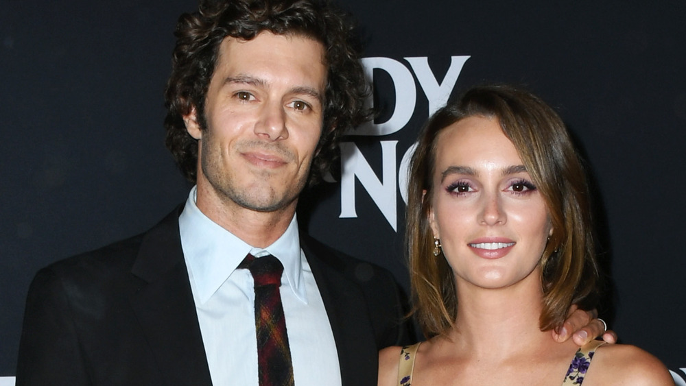 Adam Brody and Leighton Meester smiling