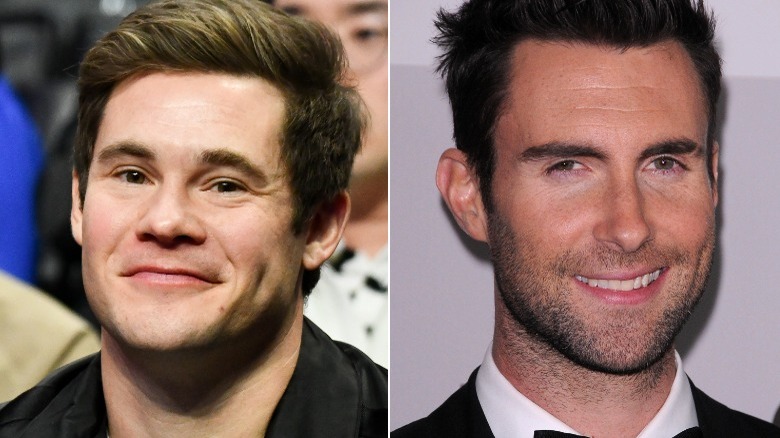 Adam Devine and Adam Levine smiling for a picture