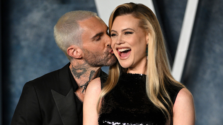 Adam Levine and Behati Prinsloo kissing