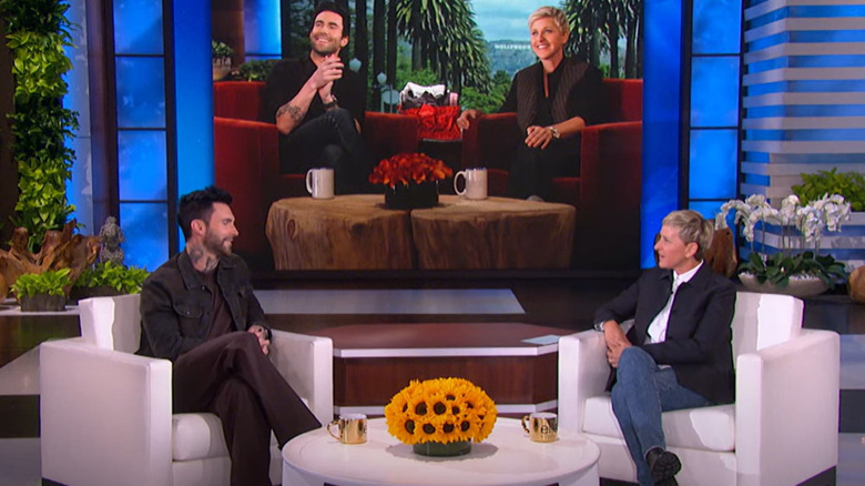 Adam Levine talking to Ellen DeGeneres