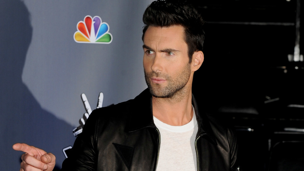 Adam Levine pointing