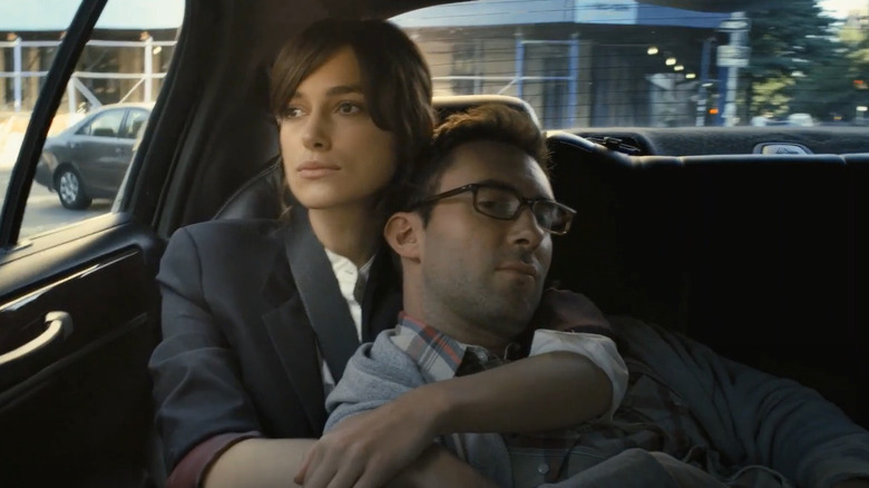 Keira Knightley with arms around Adam Levine