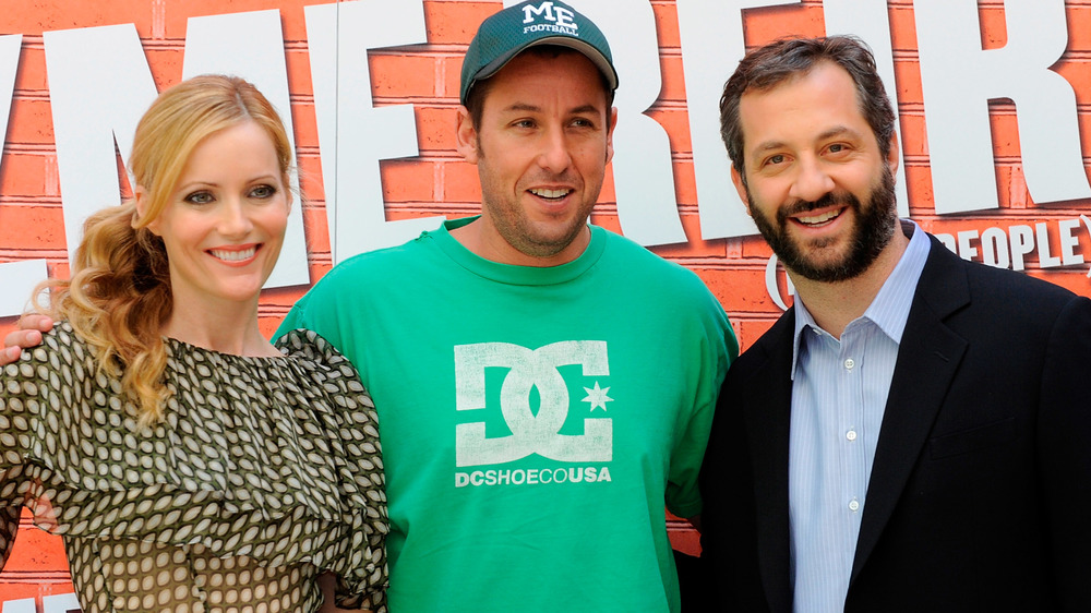 Leslie Mann poses with Adam Sandler and her husband, Judd Apatow