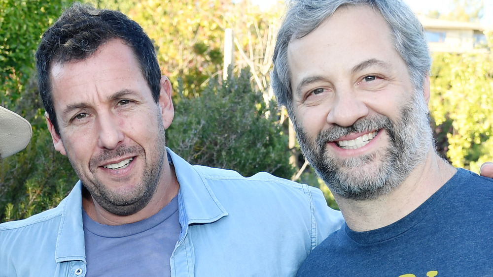 Adam Sandler poses with director Judd Apatow