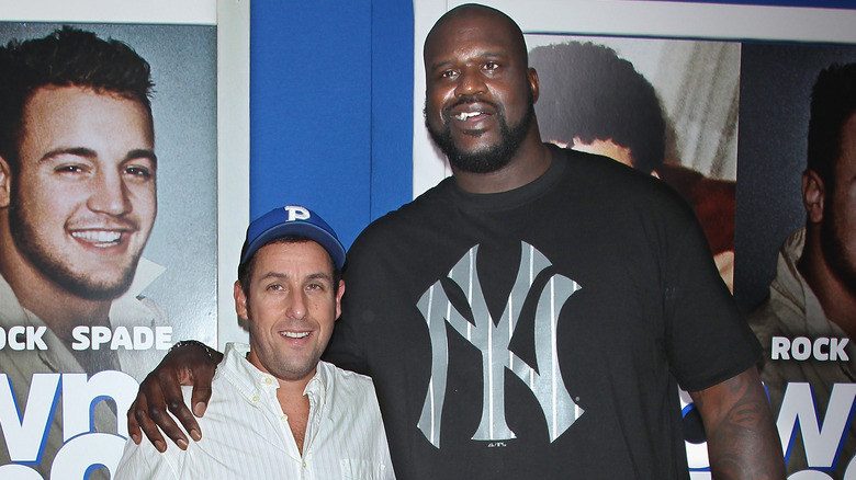 Adam Sandler and Shaquille O'Neal posing
