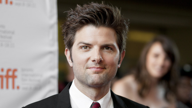 Adam Scott posing at an event