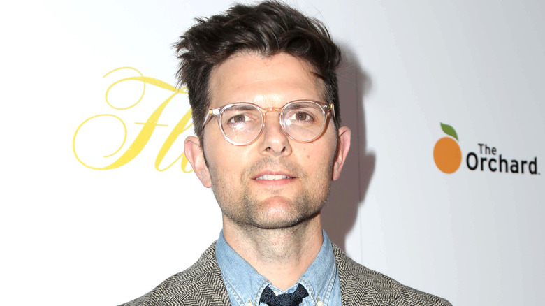 Adam Scott wearing glasses