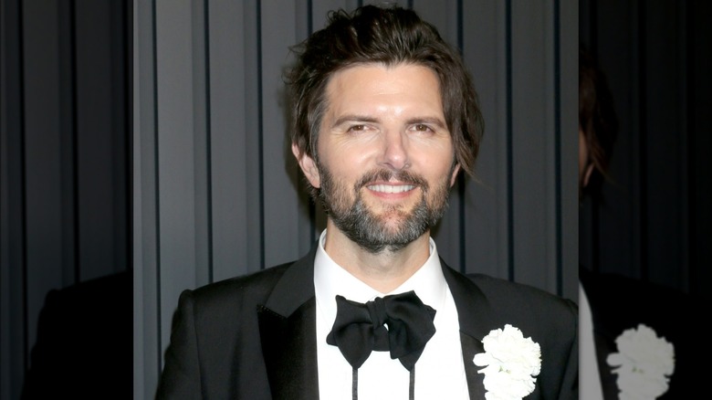 Adam Scott posing at the 2022 Emmys