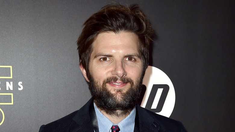 Adam Scott posing at a "Star Wars" event