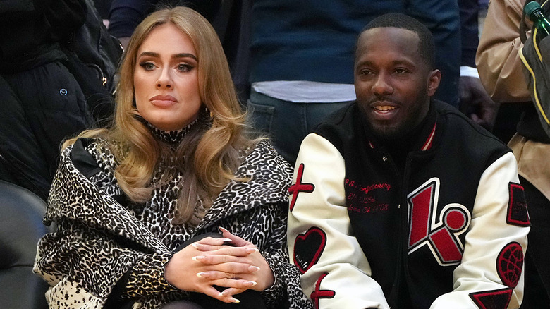 Adele and Rich Paul sitting courtside