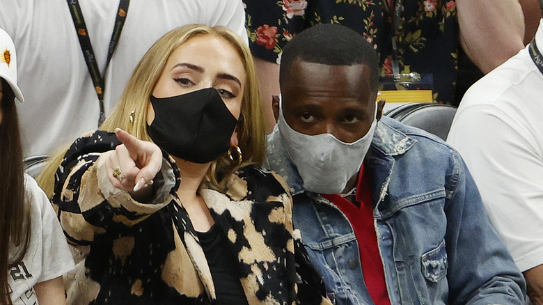 Adele and Rich Paul attend a game 