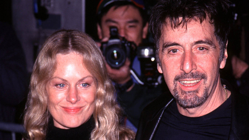 Al Pacino and Beverly D'Angelo smiling