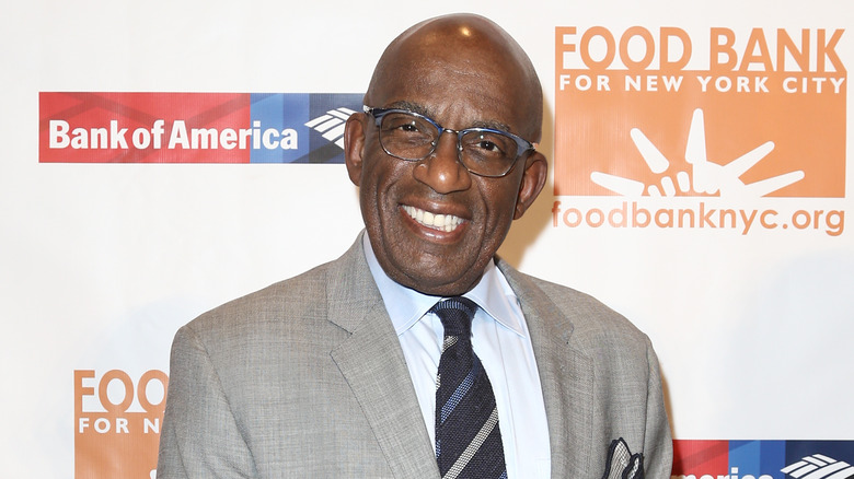 Al Roker smiles in a gray suit