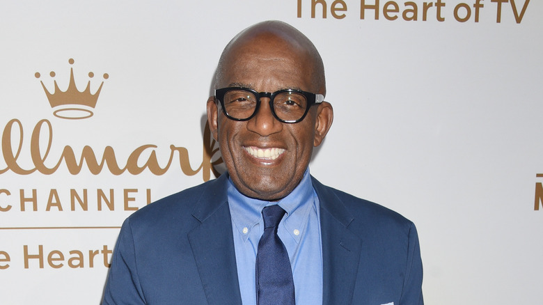 Al Roker smiling in blue suit 