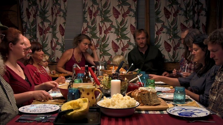 The cast of 'Alaska: The Last Frontier' sitting around a table