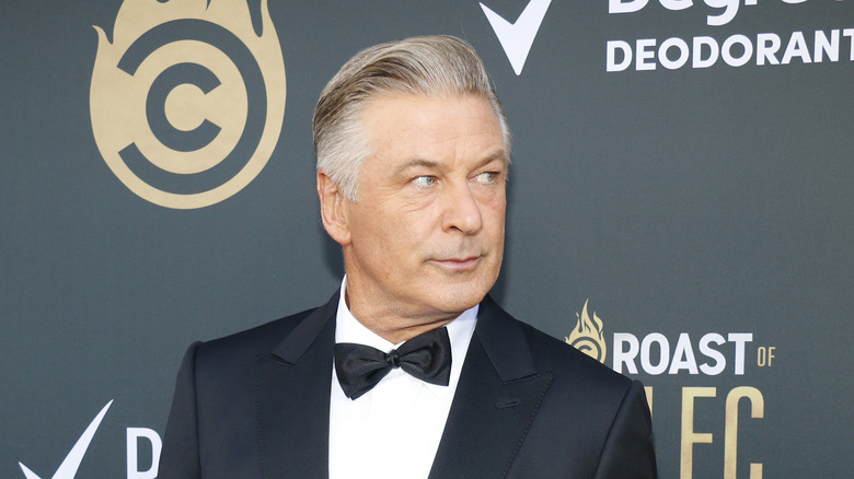 Alec Baldwin poses on the red carpet 