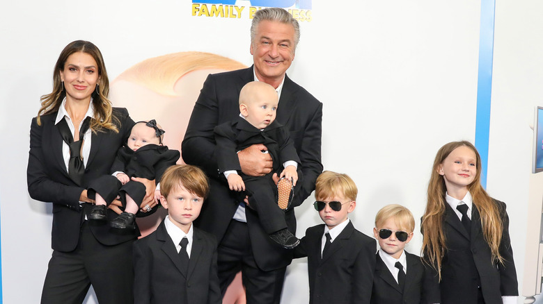 Alec and Hilaria Baldwin with kids in suits