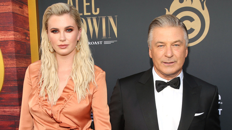 Ireland Baldwin and Alec Baldwin posing