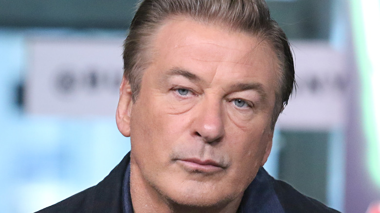 Alec Baldwin seated and facing camera