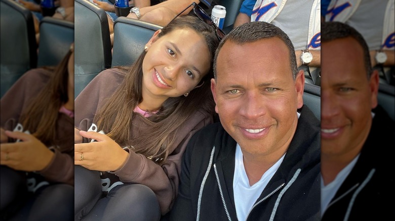  Natasha Rodriguez leaning toward Alex Rodriguez