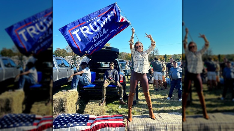 Alina Habba waving a Trump flag.