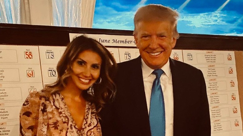 Alina Habba and Donald Trump smiling