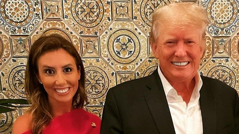 Alina Habba and Donald Trump smiling