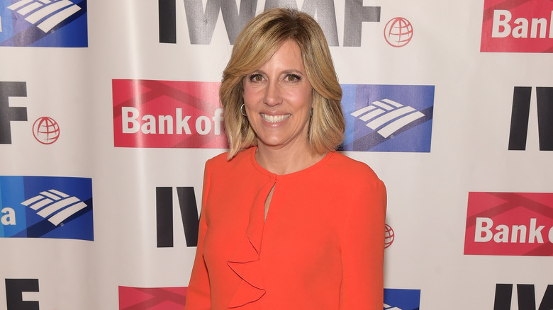 Alisyn Camerota wearing an orange dress