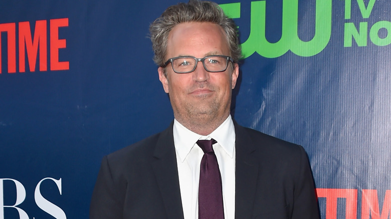 Matthew Perry wearing glasses