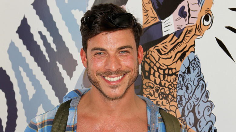 Jax Taylor grinning sunglasses on head