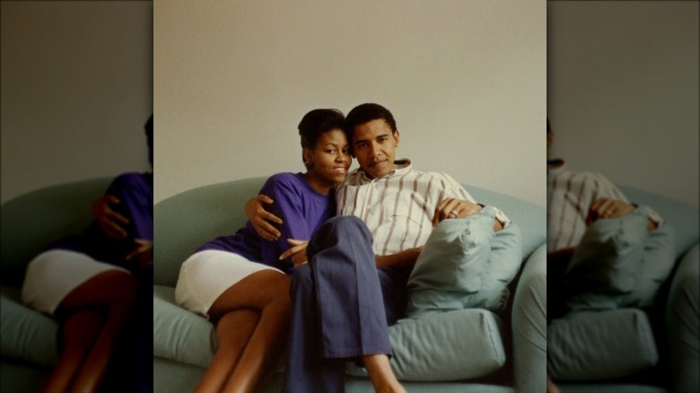 Throwback of Barack and Michelle Obama sitting on a couch