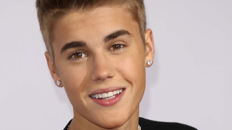 Justin Bieber smiling at an event